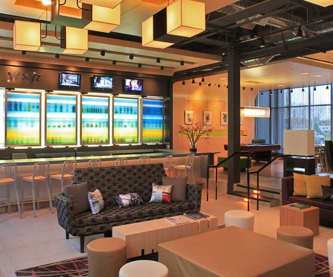 Bar area in fully-featured lobby at Aloft Hotel