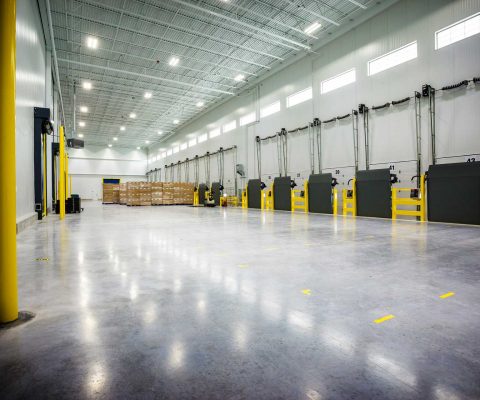 Interior view of truck docks at Golden State Foods distribution facility