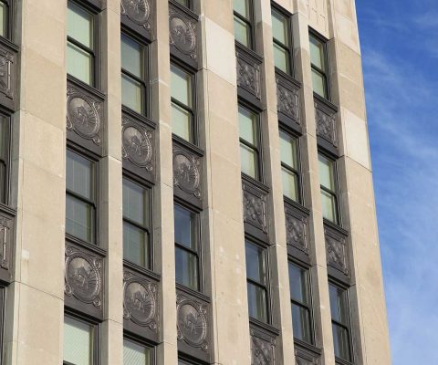 Limestone facade of Hairpin Lofts and Logan Community Center