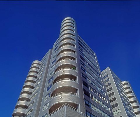 Silver corrugated aluminum panel exterior at Marina Condominiums