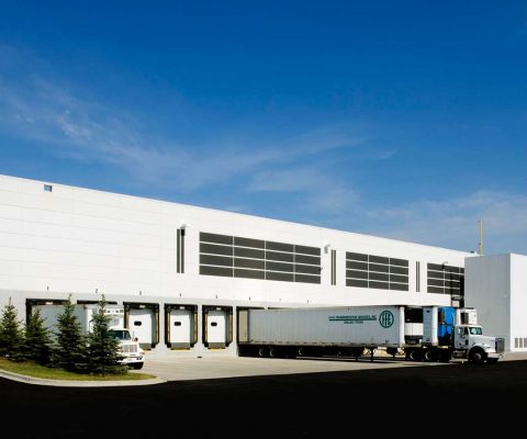 Truck docks at Quantum Foods distribution facility